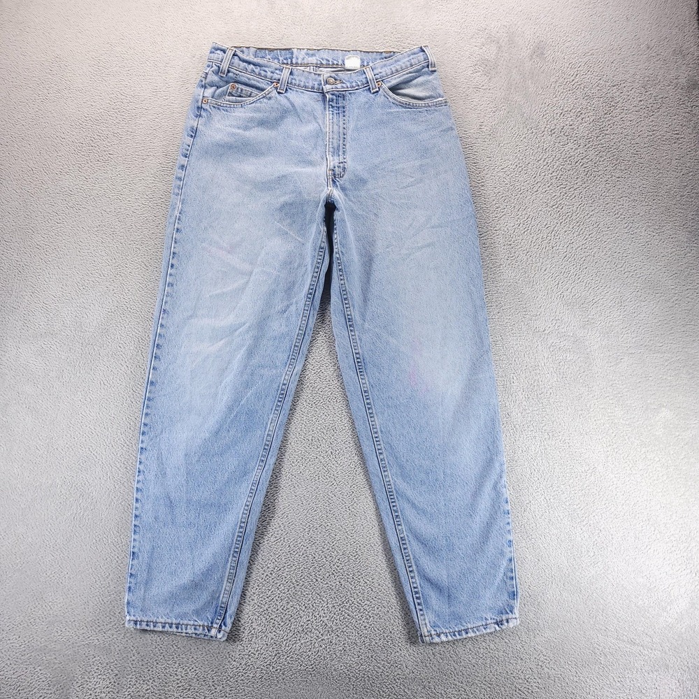 VTG Levis 560 Jeans Mens 34x32 Blue Relaxed Tapered Light Wash USA Denim 90s